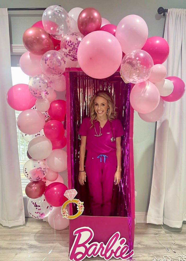 Dr. Meagan Carpenter, dressed up as Dr. Barbie at a Barbie-themed party, shows off her bright and bubbly personality that has made her a favorite among pediatric patients across southwest Alabama.