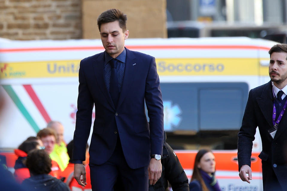 <p>Former Fiorentina player Cyprian Tatarusanu arrives to pay tribute to Astori. </p>