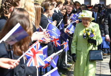 Queen Elizabeth II meets pupils during a visit to King's Bruton School where she will mark the School's 500th anniversary and open the new Music Centre, in Bruton, Somerset, Britain March 28, 2019. Ben Birchall/Pool via REUTERS