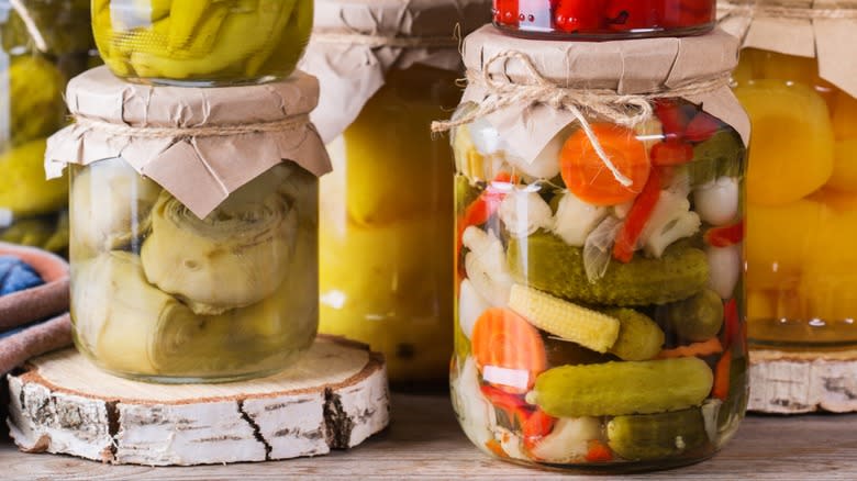 Various pickled vegetables in jars
