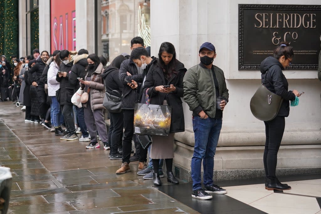 Shoppers stand in a queue for the doors to open for the start of the Boxing Day sales at Selfridges department store on Oxford Street (Jonathan Brady/PA) (PA Wire)