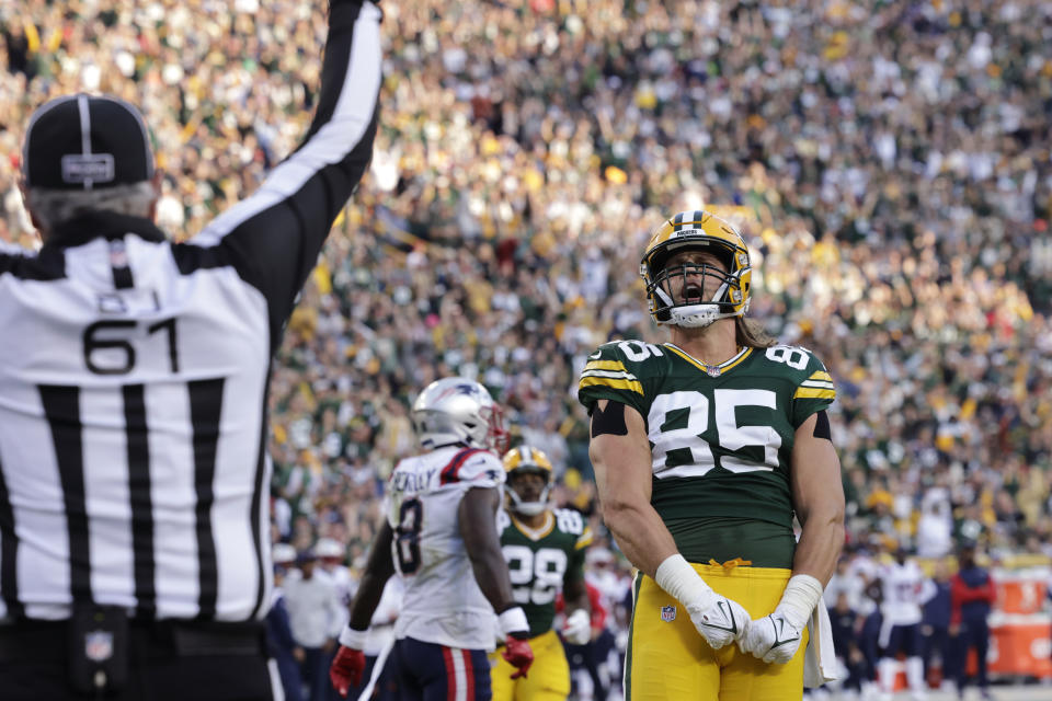 Green Bay Packers tight end Robert Tonyan (85) celebrates after catching a 20-yard touchdown against the Patriots. (AP Photo/Mike Roemer)