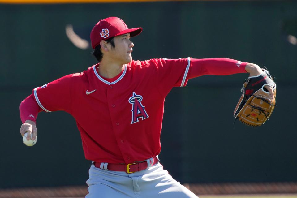 Shohei Ohtani throws at camp in Tempe on Wednesday.