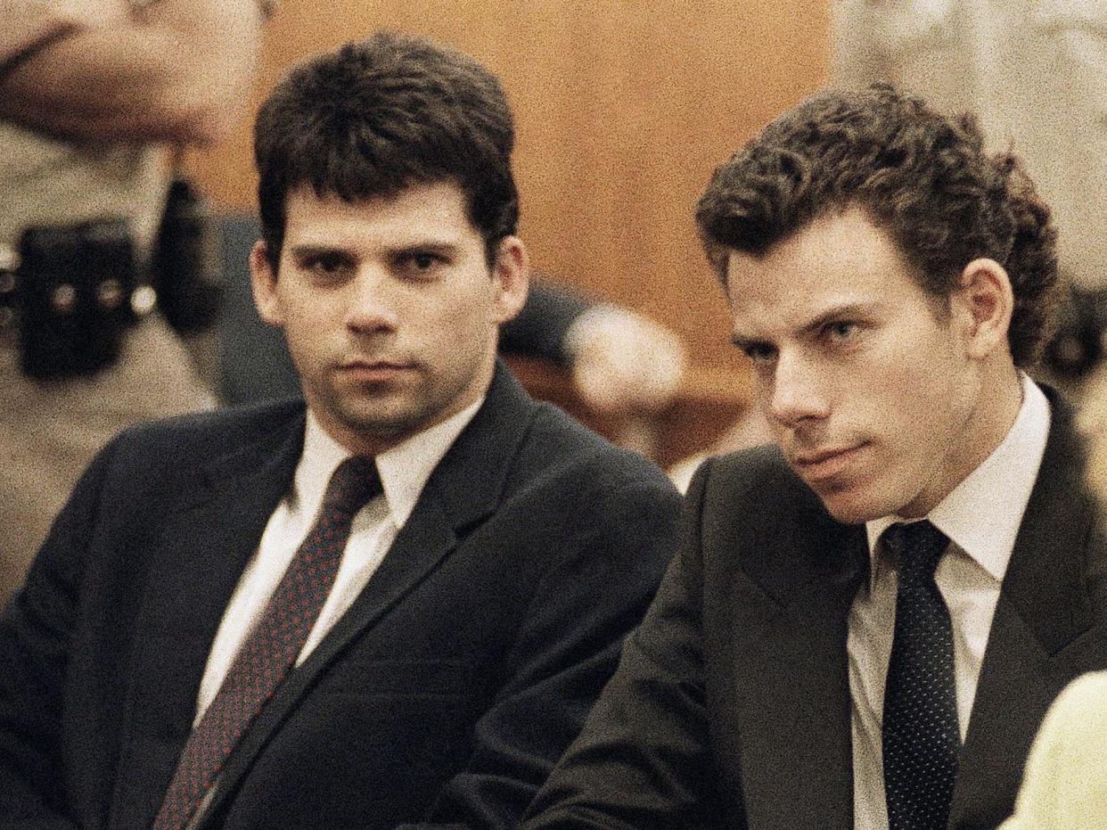 Lyle, left, and Erik Galen Menendez sit in Beverly Hills, Calif., courtroom, May 14, 1990 as a judge postponed their preliminary hearing on charges of murdering their wealthy parents last August. (AP Photo/Kevork Djansezian)