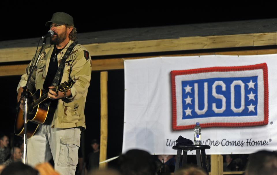 Toby Keith performs during a concert at Kandahar base in Afghanistan on May 6, 2010.