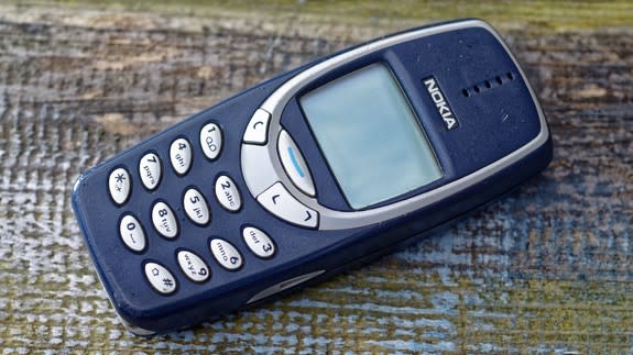 A person plays the classic mobile game Snake as the new Nokia 3310