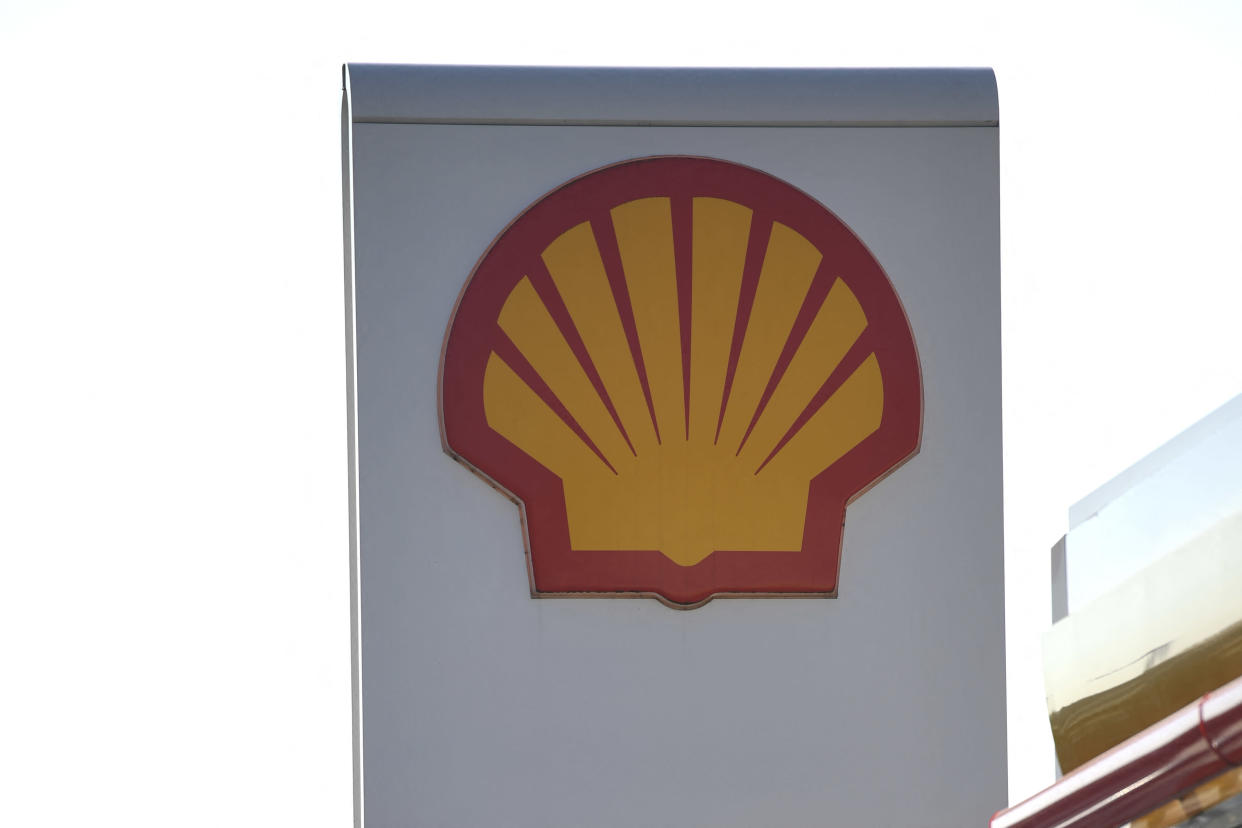 Shell&#39;s logo is pictured at a Shell petrol station, in Manchester, on March 8, 2022 as the prices of petrol and diesel fuel continue to rise. - Energy giant Shell said on March 8, 2022 it would withdraw from its involvement in Russian gas and oil, including an immediate stop to purchases of crude from the country. The company also said it would shut its service stations, aviation fuels and lubricants operations in Russia. (Photo by Oli SCARFF / AFP) (Photo by OLI SCARFF/AFP via Getty Images)