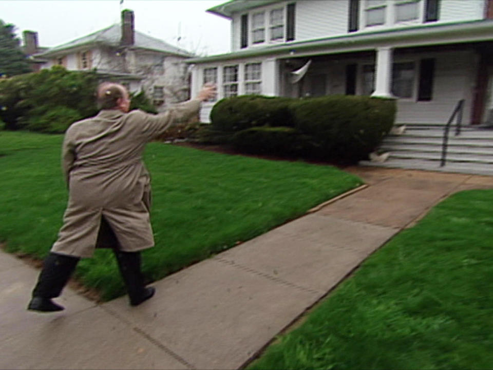 Charles Osgood shows off his pitching arm.  / Credit: CBS News