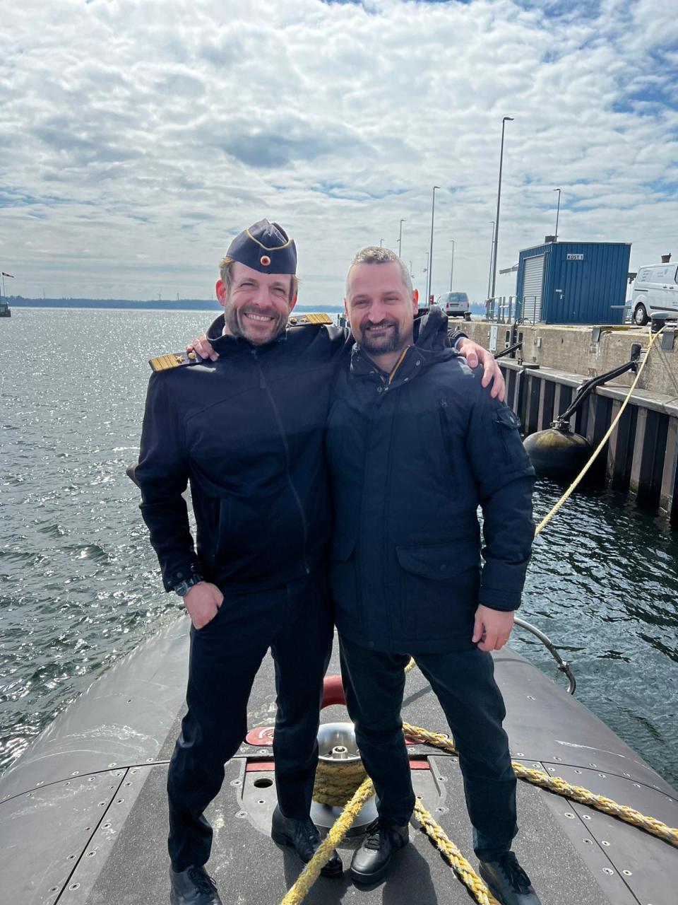 Squadron Commander Lars Goessing (left), and author on the deck of the Type 212A class submarine <em>U-32</em> (S-182).<em> Photo by Manrico Balg</em>