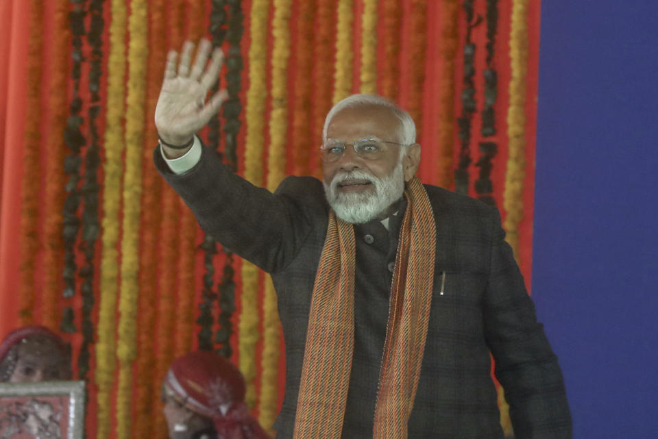 Indian Prime Minister Narendra Modi waves at a public rally at the Bakshi Stadium in Srinagar, Indian controlled Kashmir, Thursday, March 7, 2024. Modi on Thursday made his first official visit to Kashmir's main city since New Delhi stripped the disputed region of semi-autonomy and took direct control of it in 2019. (AP Photo)