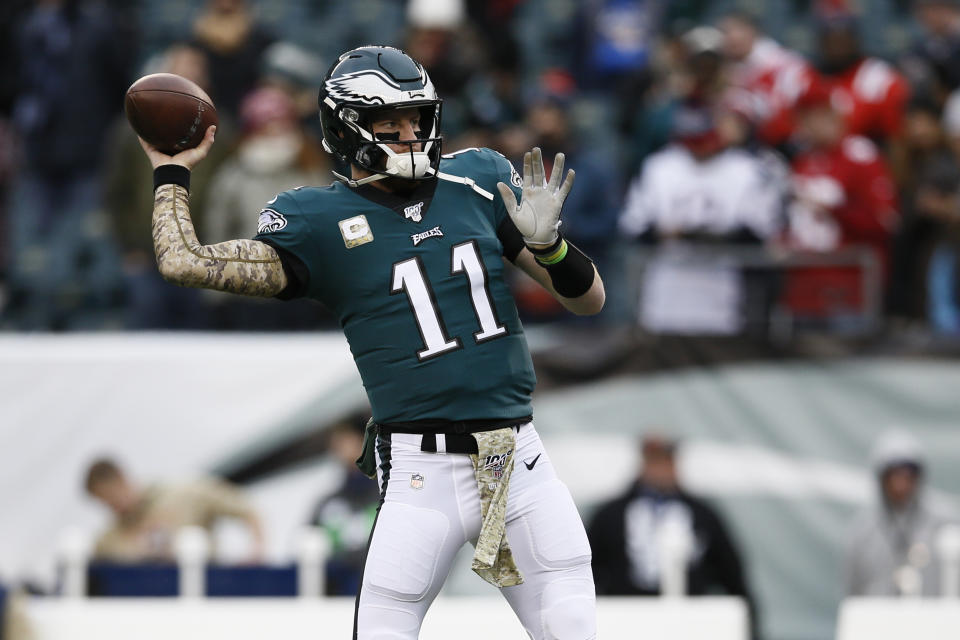 Philadelphia Eagles' Carson Wentz warms up before an NFL football game against the New England Patriots, Sunday, Nov. 17, 2019, in Philadelphia. (AP Photo/Michael Perez)