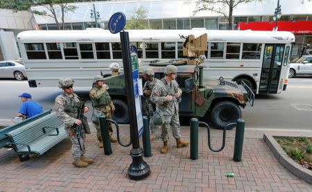 National Guard soldiers set up around the city in preparation for potential protesting of the police shooting of Keith Scott in Charlotte, North Carolina, U.S. September 23, 2016. REUTERS/Jason Miczek