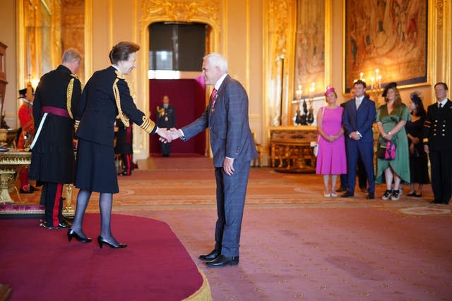Dan Dark is made an OBE by the Princess Royal at Windsor Castle 