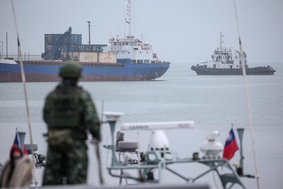 A member of Taiwan’s military (front) takes part in routine exercises at Liaoluo Port in Kinmen (AFP via Getty Images)