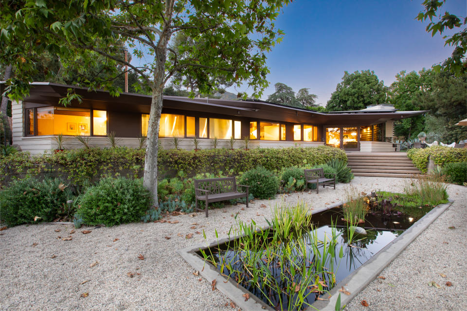 Exterior shot of a bungalow with a modern garden