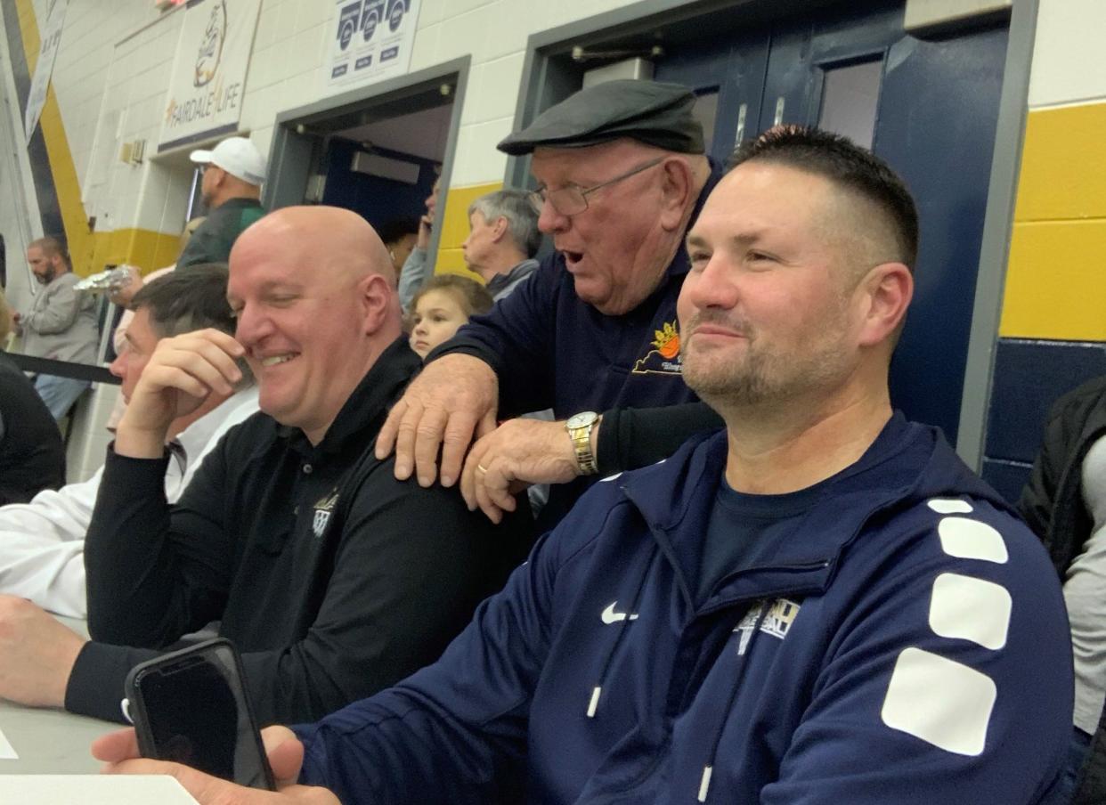 Stanley Hardin, center, shares a laugh with Male High School boys basketball coach Tim Haworth, left, and Fairdale boys basketball coach David Hicks during the 2019 King of the Bluegrass Holiday Classic at Fairdale. Hardin, a co-founder of the KOB, died Nov. 9, 2022.