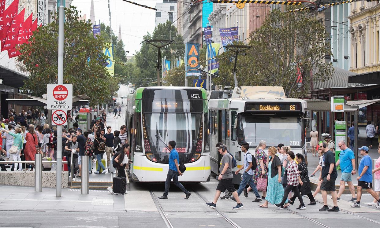 <span>City of Melbourne data shows average general pedestrian activity near the town hall at the highest it has been since 2015, and two-and-a-half times higher than in 2020.</span><span>Photograph: Ellen Smith/AAP</span>