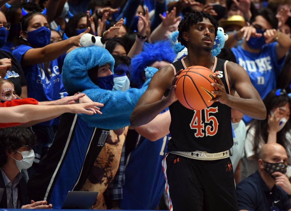 Nov 13, 2021; Durham, North Carolina, USA; Campbell Camels forward Cedric Henderson Jr. (45) is harassed by Duke Blue Devils fans as he attempts to inbound the ball during the second half at Cameron Indoor Stadium. Mandatory Credit: Rob Kinnan-USA TODAY Sports
