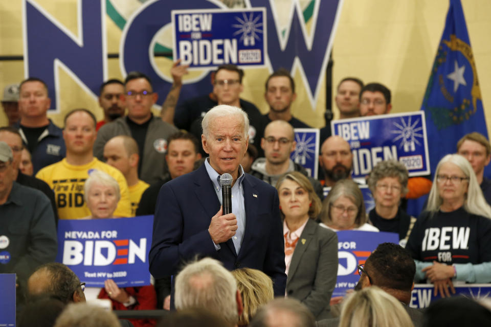 Democratic presidential candidate and former Vice President Joe Biden, center, speaks at a campaign event in Reno, Nev., Monday, Feb. 17, 2020. (AP Photo/Rich Pedroncelli)