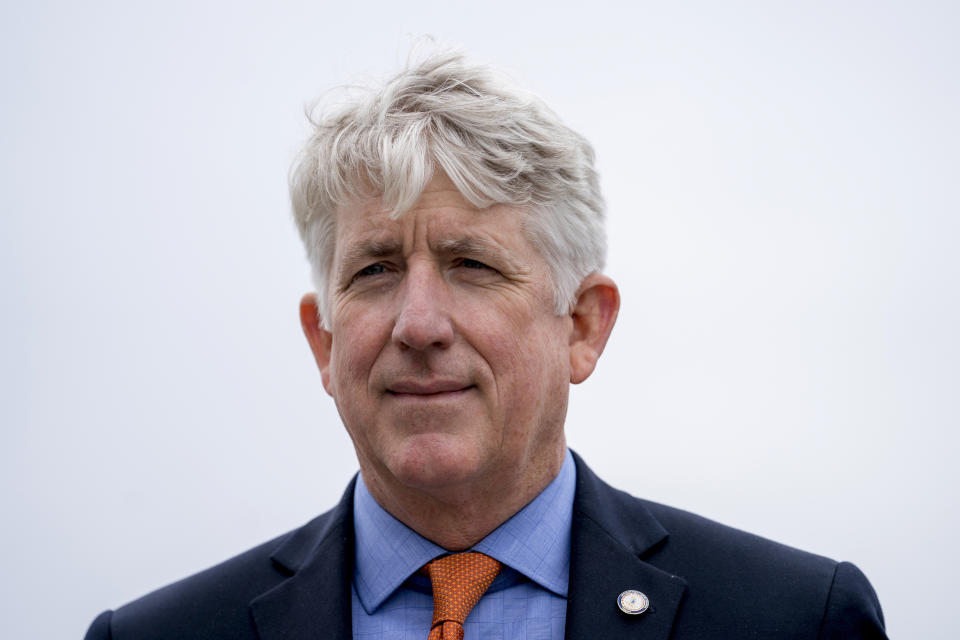 FILE - In this Feb. 26, 2018, file photo, Virginia Attorney General Mark Herring attends a news conference near the White House in Washington. While national attention was focused and rumors were sweeping through Virginia’s Capitol, Herring revealed to black lawmakers during a meeting that he had worn brown makeup during a college bash in 1980. He later issued a public statement. (AP Photo/Andrew Harnik, File)