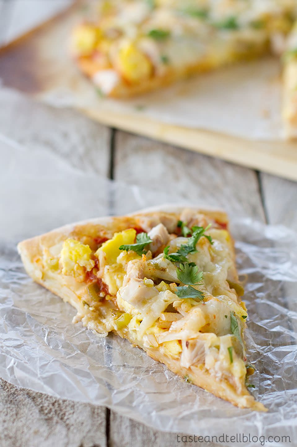 <p>Green chiles, taco seasoning, and your favorite salsa are a delicious combo, but it's the extra turkey that turns out to be the star on this southwestern slice.</p><p><strong>Get the recipe at <a href="https://www.tasteandtellblog.com/mexican-turkey-breakfast-pizza/" rel="nofollow noopener" target="_blank" data-ylk="slk:Taste and Tell Blog;elm:context_link;itc:0;sec:content-canvas" class="link ">Taste and Tell Blog</a>.</strong> </p>