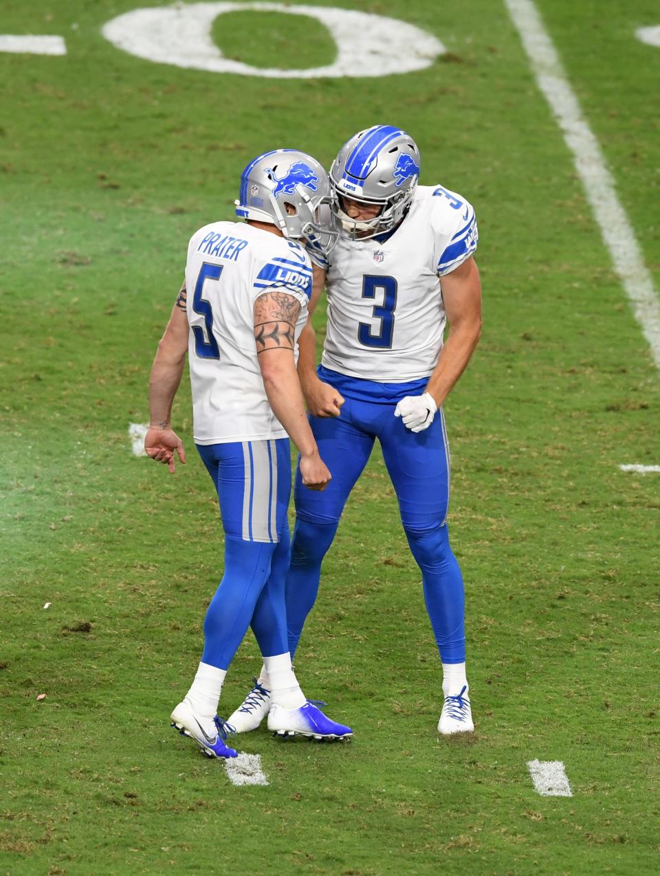Detroit Lions kicker Matt Prater celebrates with punter/holder Jack Fox after kicking the winning 39-yard field goal against the Arizona Cardinals during the fourth quarter at State Farm Stadium on Sept. 27, 2020 in Glendale, Arizona. Lions won 26-23.