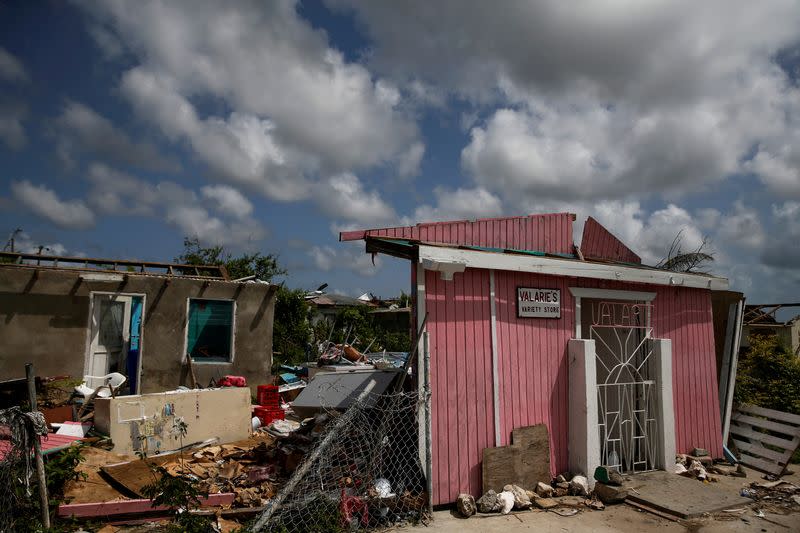 FILE PHOTO: Homes sit in ruins at Codrington on the island of Barbuda