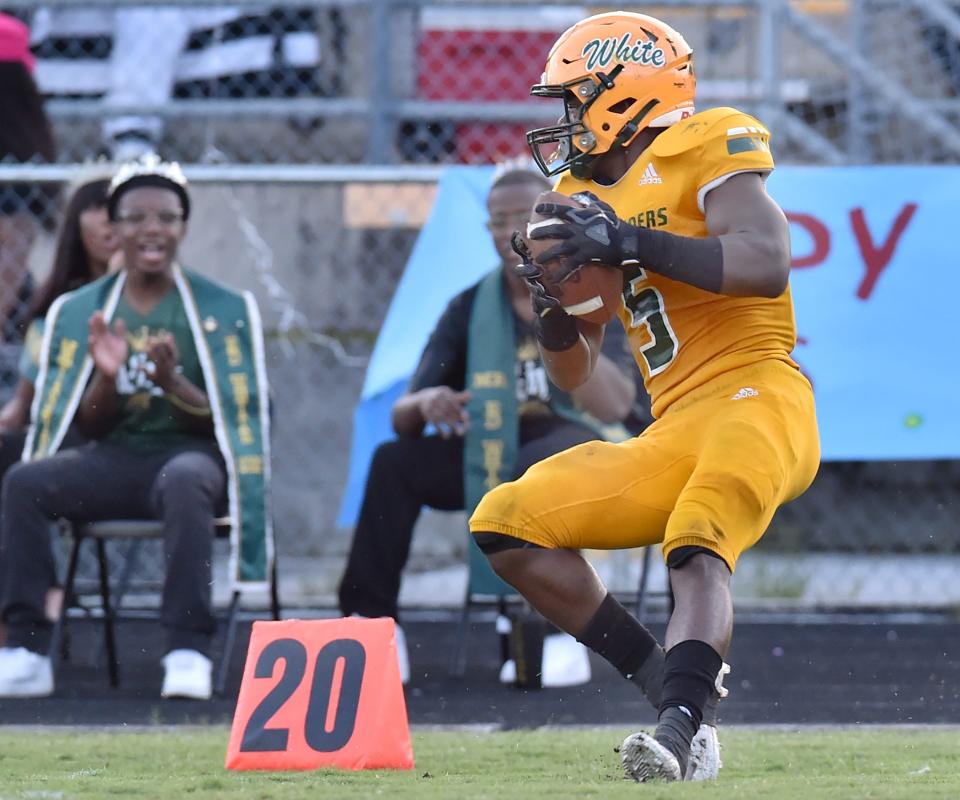 Ed White safety Davaughn Patterson comes down with an interception on a pass against Atlantic Coast in September 2021.