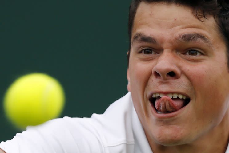 <p>Milos Raonic of Canada returns to Andreas Seppi of Italy during their men’s singles match on day four of the Wimbledon Tennis Championships in London, Thursday, June 30, 2016. (AP Photo/Ben Curtis)</p>
