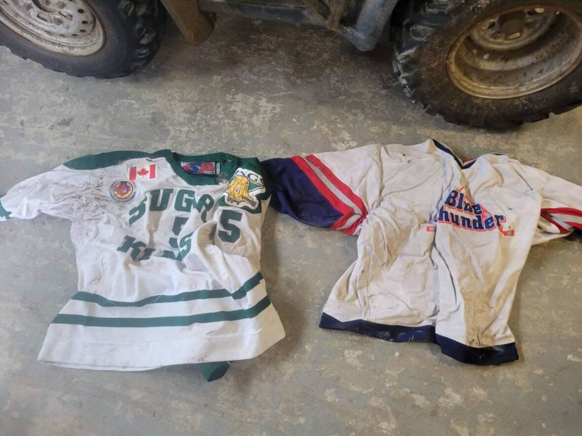 These jerseys, belonging to David Savery, were pulled from the wreckage in Port aux Basques months after post-tropical storm Fiona ripped through the town. They are treasured keepsakes for his parents, who lost their home in the storm. (Peggy Savery/Facebook - image credit)