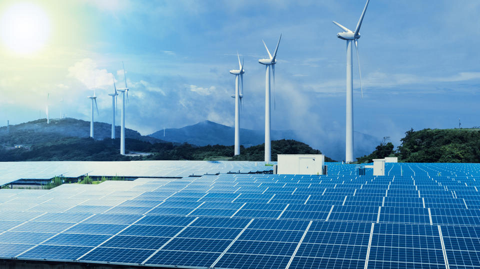 Solar and wind farm in a hilly region.