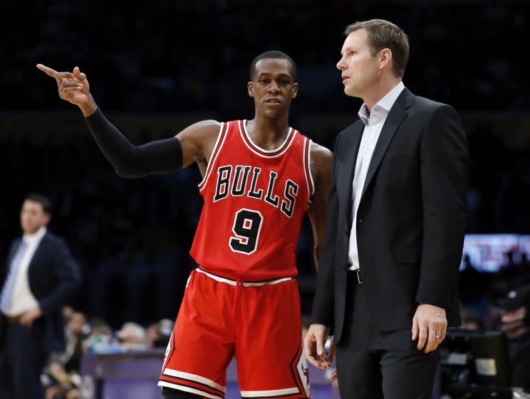 Rajon Rondo points Fred Hoiberg in the right direction. (AP)