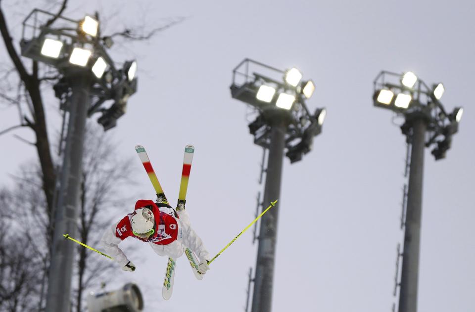 Canada's Maxime Dufour Lapointe performs a jump during the women's freestyle skiing moguls qualification round at the 2014 Sochi Olympic Games in Rosa Khutor February 6, 2014. REUTERS/Lucas Jackson (RUSSIA - Tags: OLYMPICS SPORT SNOWBOARDING)