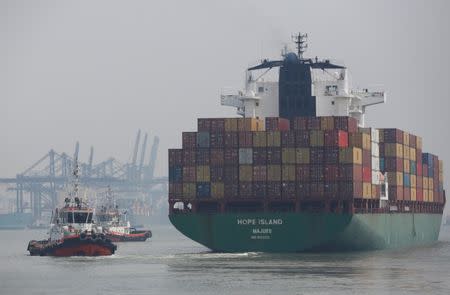 A container ship leaves the New Priok Container Terminal One (NPTC1) in Tanjung Priok, North Jakarta, Indonesia, May 26, 2017. REUTERS/Darren Whiteside