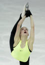 Gracie Gold of the United States skates during a practice session at the figure stating practice rink at the 2014 Winter Olympics, Monday, Feb. 17, 2014, in Sochi, Russia. (AP Photo/Darron Cummings)