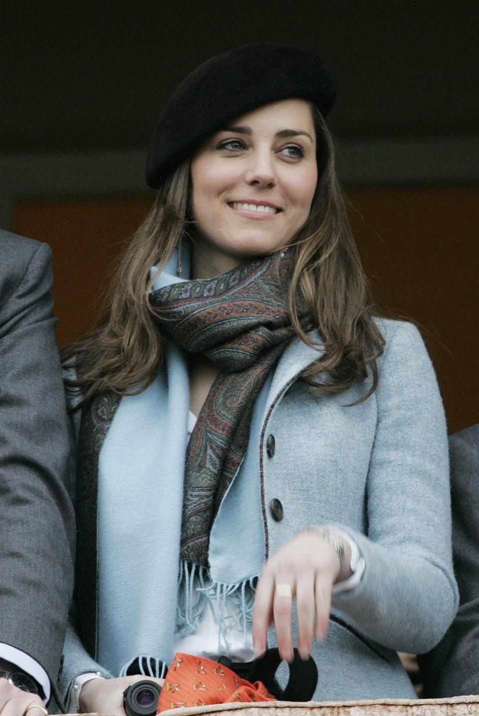 <p>At the final day of Cheltenham Festival in Gloucestershire, England wearing a black beret and paisley scarf.</p>