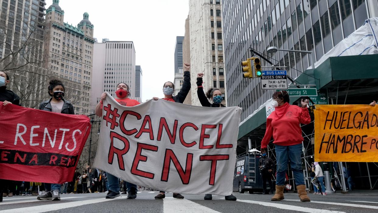 Around two hundred people protesting evictions and cancel rent are pictured on Broadway near Chamber Street Wednesday afternoon. NYPD arrested 14 protesters for blocking traffic. 