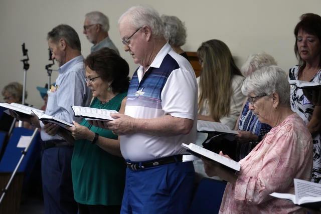 Members of the congregation sing during service at the Grace Methodist Church Sunday, May 14, 2023, in Homosassa Springs, Fla. Grace Methodist Church launched in January after their previous congregation voted to stay in the UMC. The new church immediately affiliated with the Global Methodist Church. (AP Photo/Chris O'Meara)