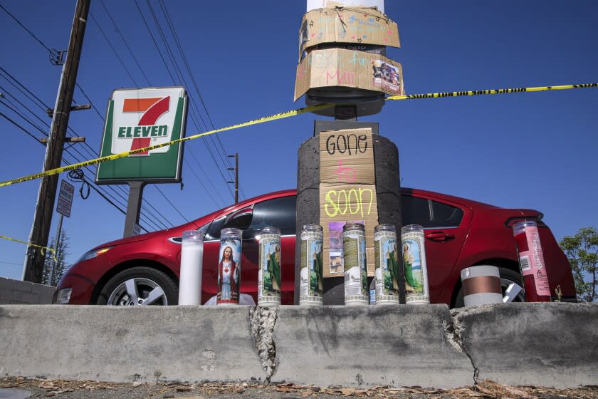 Brea, CA - July 12: A rash of robbery-shootings at Southland 7-Eleven stores has left at least two people dead, with police saying today some of the crimes appear to be related. A makeshift memorial for 40-year-old Matthew Hirsch, a 7-Eleven store clerk who was fatally shot in early hours of Monday morning at the store located at 100 block of W Lambert Rd on Tuesday, July 12, 2022 in Brea, CA. (Irfan Khan / Los Angeles Times)