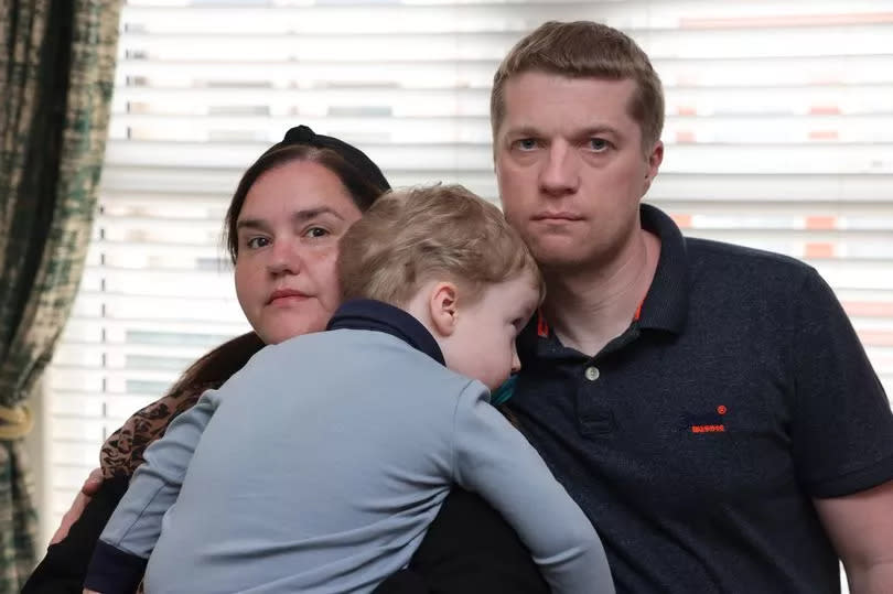 Natalie Parr and her partner and son, Harley at home in Bootle