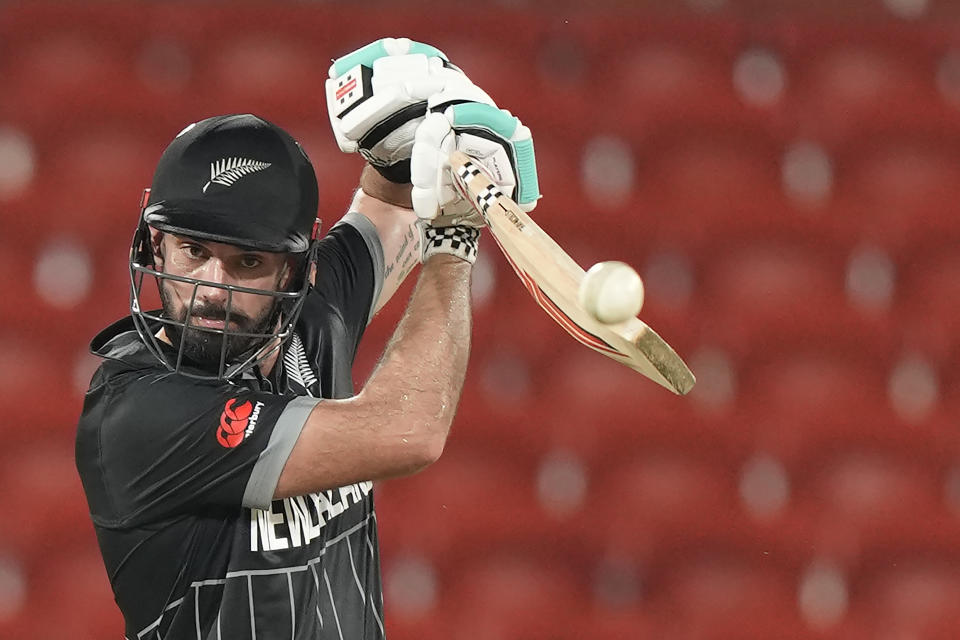 New Zealand's Daryl Mitchell plays a shot during the ICC Cricket World Cup warmup match between New Zealand and Pakistan in Hyderabad, India, Friday, Sept. 29, 2023. (AP Photo/Mahesh Kumar A.)