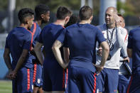 Gregg Berhalter, right, head coach of the U.S. Men's National Soccer team, instructs some of his players during drills Wednesday, Jan. 8, 2020, in Bradenton, Fla. The team moved its training camp from Qatar to Florida in the wake of Iran's top military commander being killed during a U.S. airstrike in the Middle East. (AP Photo/Chris O'Meara)