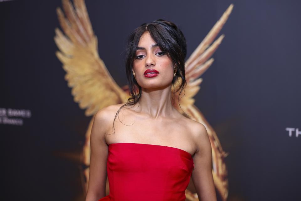 Sabrina Bahsoon poses for photographers upon arrival at the World premiere of the film 'The Hunger Games: The Ballad of Songbirds and Snakes' on Thursday, Nov. 9, 2023 in London. (Vianney Le Caer/Invision/AP)