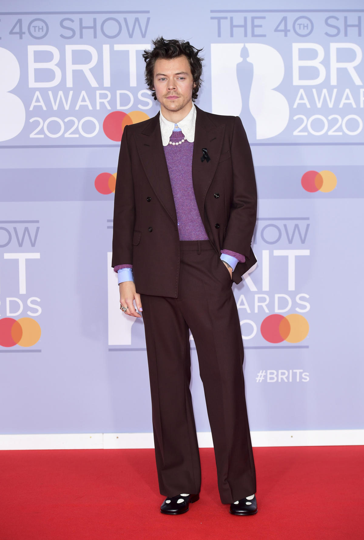 Harry Styles' most stylish moments: from pink feathers at