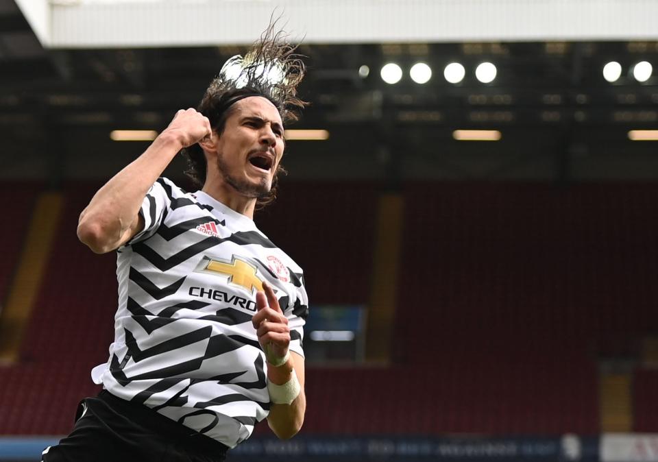 Edinson Cavani celebrates after scoring United’s third goal (Reuters)