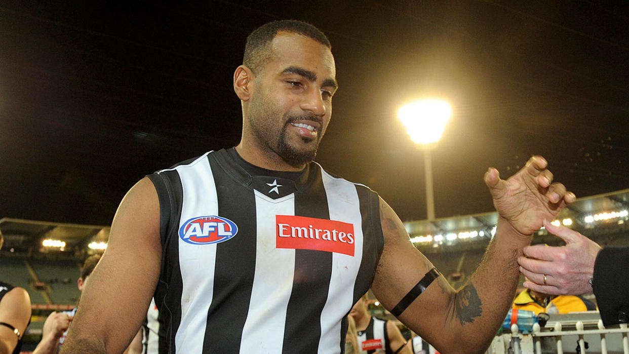 Pictured here, former Collingwood player Heritier Lumumba greets fans after a match.
