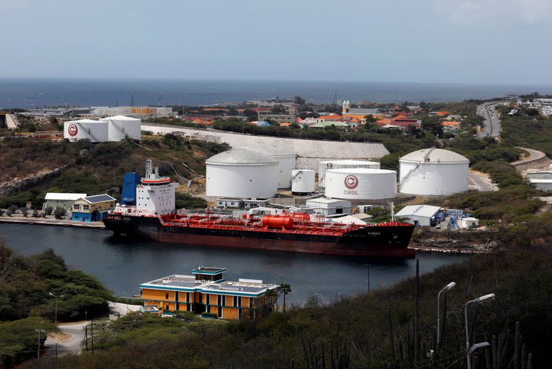 FILE PHOTO: A crude oil tanker is docked at Isla Oil Refinery PDVSA terminal in Willemstad on the island of Curacao
