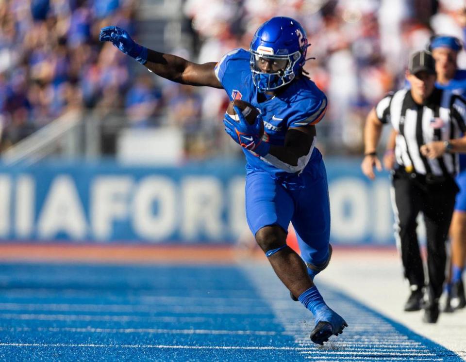 Boise State running back Ashton Jeanty stays inbounds after a pass reception and runs to the end zone for the Broncos first score against UCF, Saturday, Sept. 9, 2023.