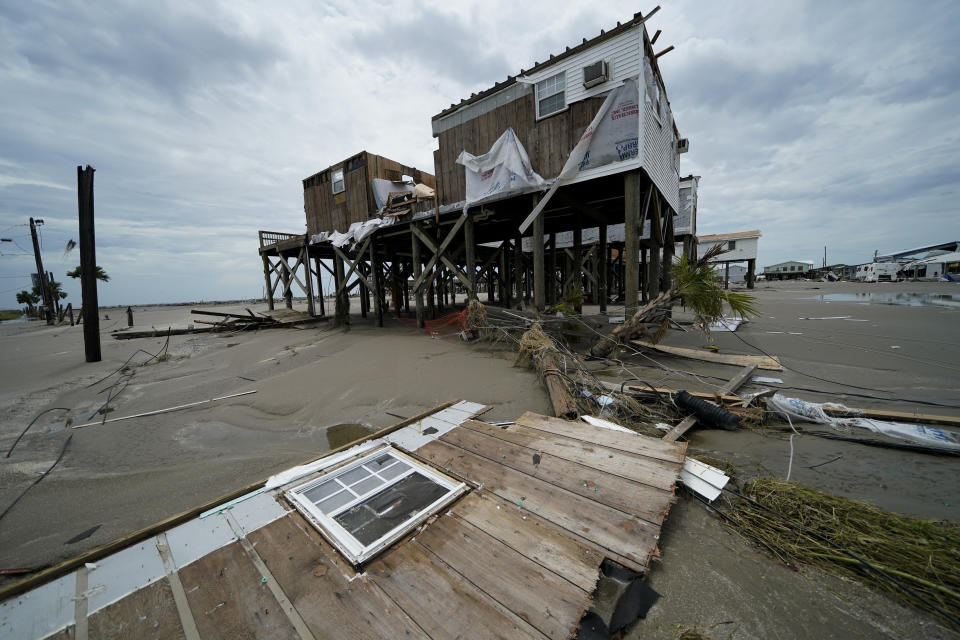 The remains of homes are seen in the aftermath of Hurricane Ida in Grand Isle, La., Tuesday, Aug. 31, 2021. (AP Photo/Gerald Herbert)