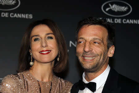 72nd Cannes Film Festival - The Kering Women In Motion Honor Awards as part of Cannes Film Festival Presidential dinner - Arrivals - Cannes, France, May 19, 2019. Mathieu Kassovitz and Elsa Zylberstein pose. REUTERS/Regis Duvignau